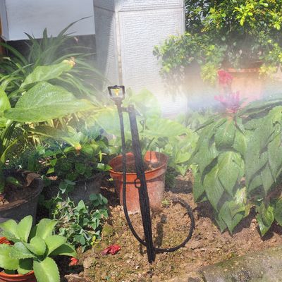 Boquilla atomizadora de refracción para riego de jardín con rociador de control de presión de agua